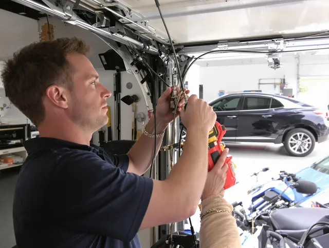 Colchester Garage Door Repair safety certified technician performing cable replacement in Colchester