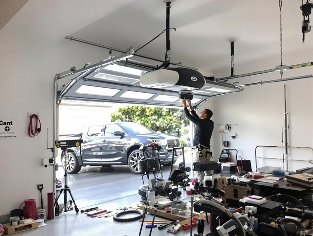 Colchester Garage Door Repair specialist installing smart garage door opener system in Colchester home