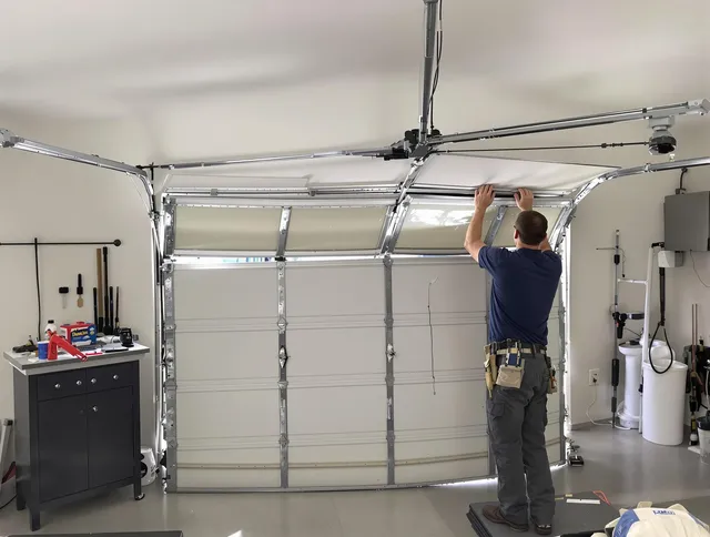 Colchester Garage Door Repair specialist performing precise section replacement on Colchester garage door