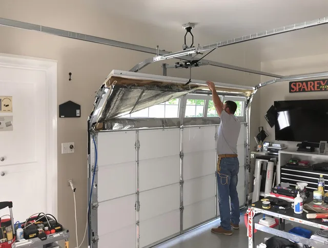 Garage door section replacement by Colchester Garage Door Repair in Colchester