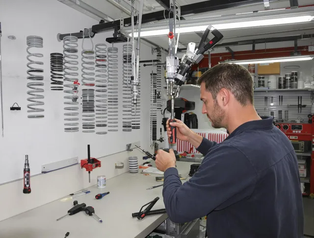 Colchester Garage Door Repair safety certified technician performing precision spring replacement in Colchester