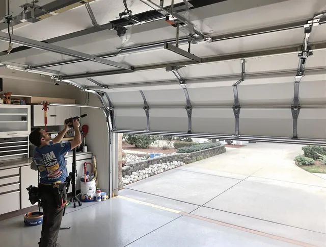 Garage door track repair service by Colchester Garage Door Repair in Colchester